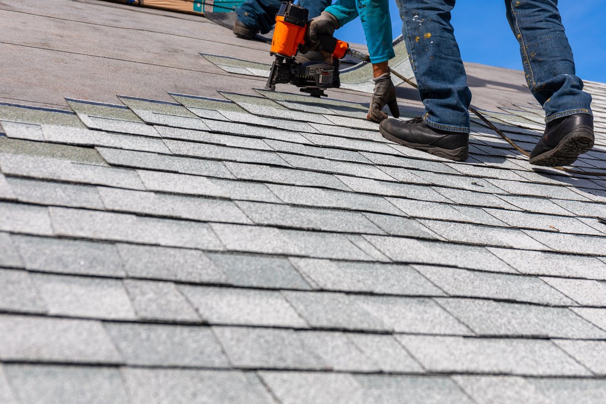 roofing contractors in Falls Church VA completing a replacement